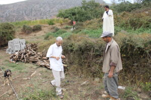 Mohammed the water diviner at work on Farm Finn.
